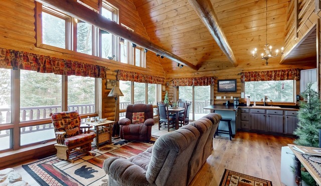 Spacious and beautiful lakefront log home on 7 acres with private dock
