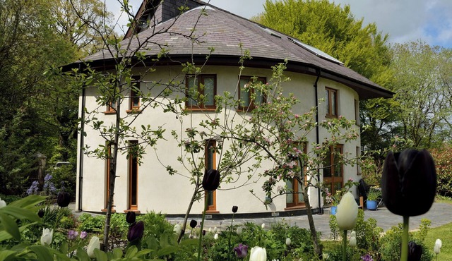 Spacious and luxurious eco-friendly detached house for 8 set in rural Carmarthenshire.