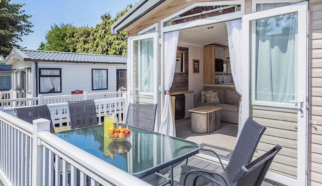 Spacious and luxurious 12ft-wide caravan with one double and two twin bedrooms.