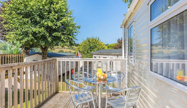 Spacious and luxurious 12ft-wide caravan with one double and one twin bedroom.