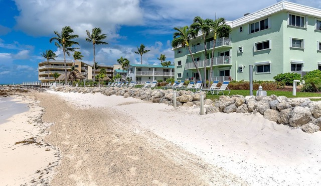 Spacious and sunny 2 bedroom condo just steps from the private beach!