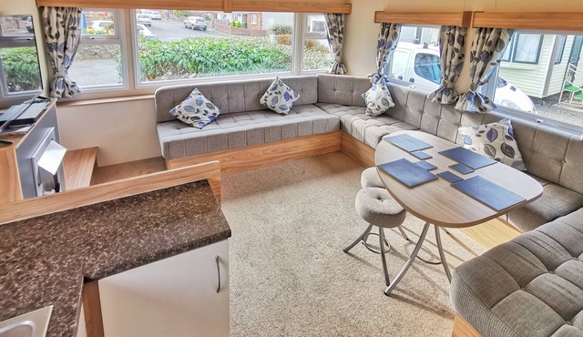 Spacious and well-presented 12ft-wide caravan with one double and one twin.