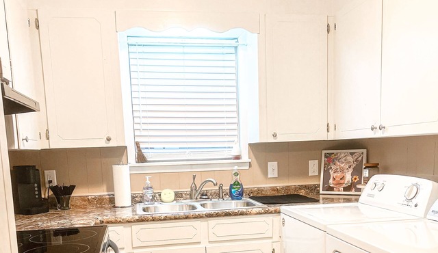 Spacious Apartment with Private Entrance and Covered Parking