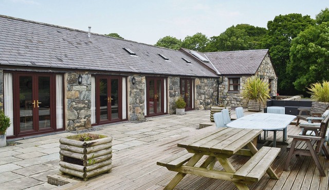 Spacious barn conversion with a riverside location.