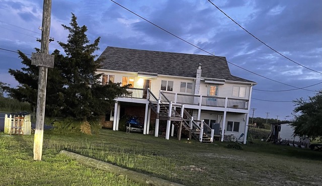 Spacious beachhouse steps to the beach. Quiet & private.