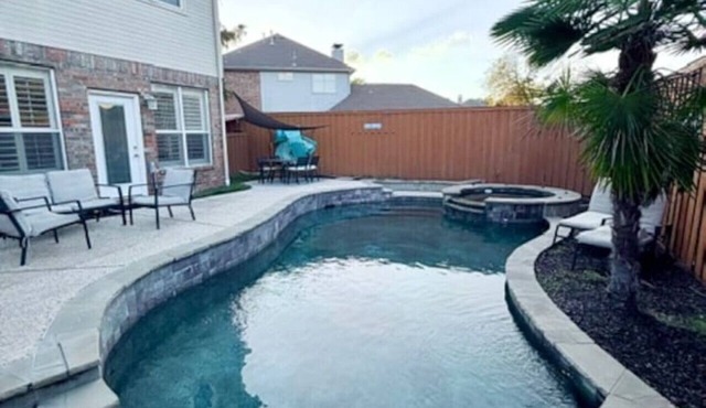Spacious Centrally Located with Heated Pool