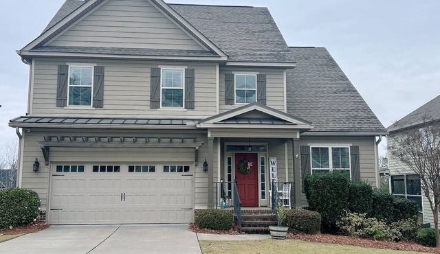 Spacious & Charming 5-Bedroom Family Home in Quiet Evans Neighborhood.