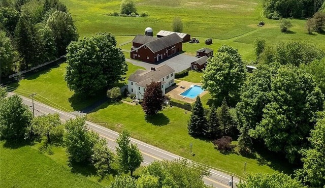 Spacious Colonial Farmhouse on 240 Acres