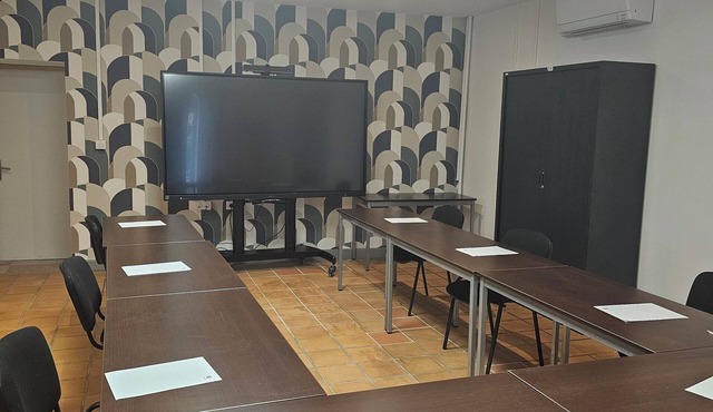 Spacious, comfortable accommodation on the village square in Occitanie