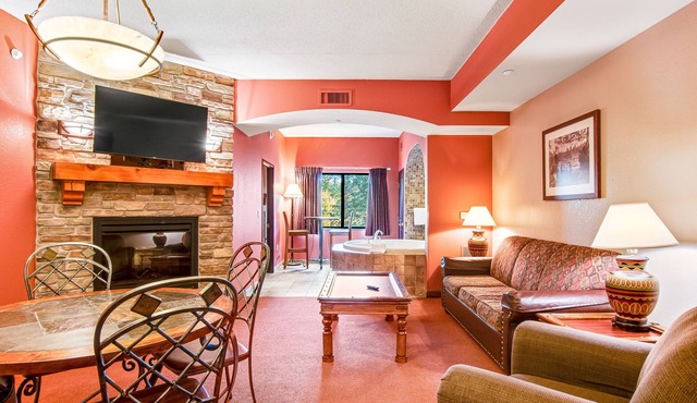 Spacious condo & studio with fireplaces, full kitchen, jetted tub, AC, & balcony