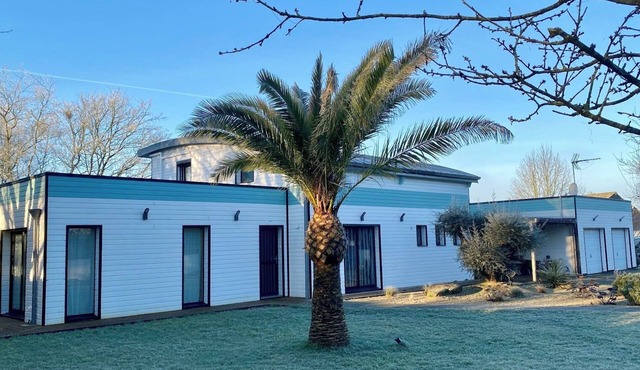 Spacious contemporary wooden house with swimming pool near the Brocéliande forest