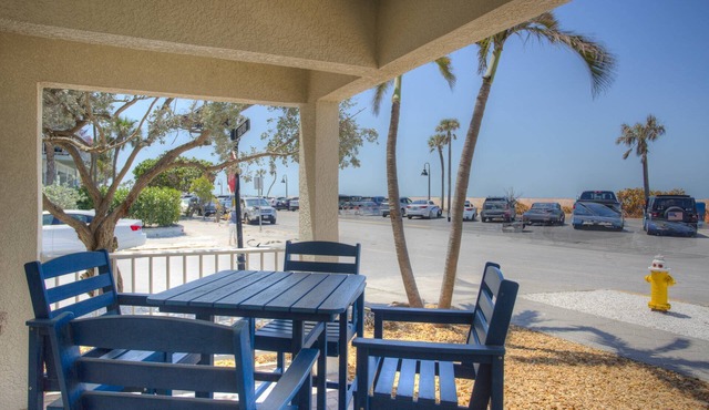 Spacious corner unit on Pass-A-Grille Beach. Beach access Heated pool. Next to restaurants and shops