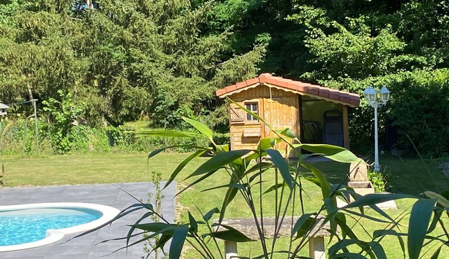 Spacious cottage with pool and terrace in village