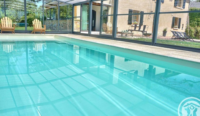 Spacious cottages with private pool, sauna, pets allowed, and parking, up to 18 people