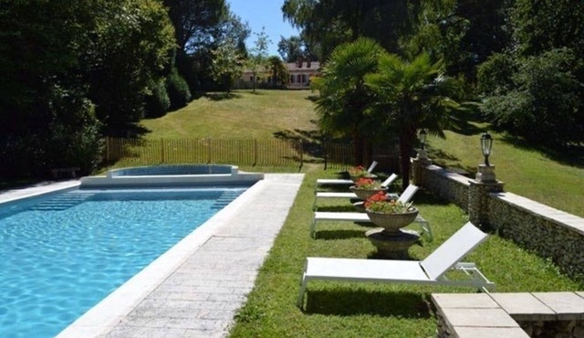 Spacious country home with annex, pool, huge garden & own forest for 14 guests.