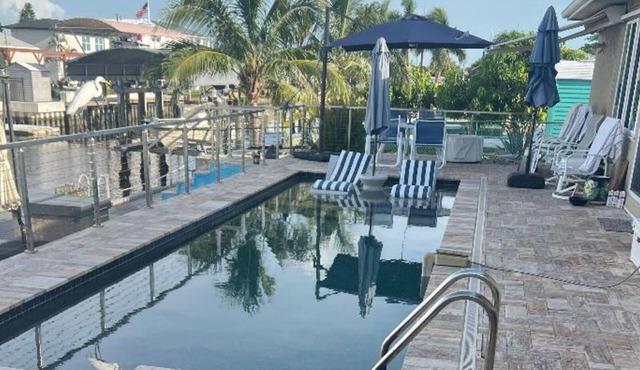 Spacious Ellenton Escape – 3 Bedrooms, Pool, Dock with Boat Slip & Full AC