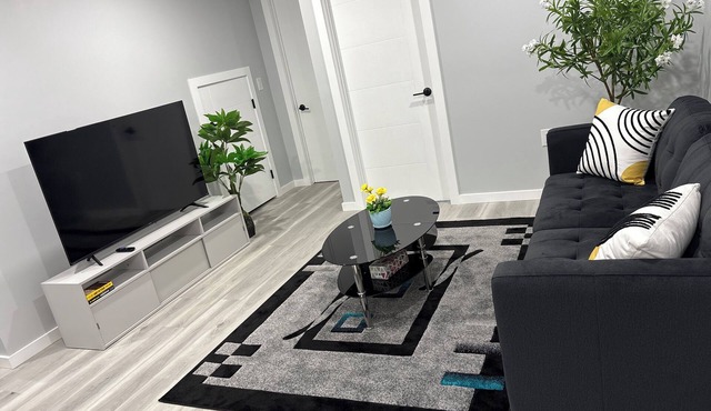 Spacious Entire Basement Suite + Parking | Self Check-In + Wi-Fi