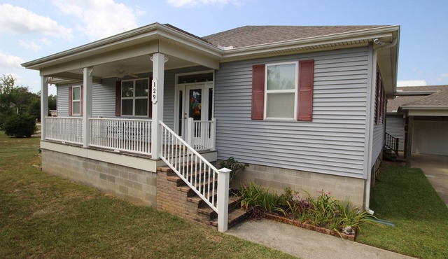 Spacious Family Friendly Home with large covered deck close to the Beach