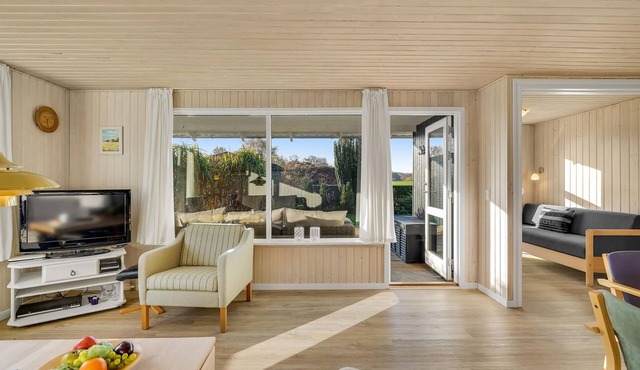 Spacious, family-friendly cottage in a quiet location close to the beautiful sandy beach.