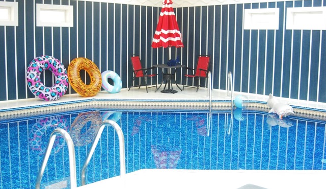 Spacious family friendly home with a heated indoor pool