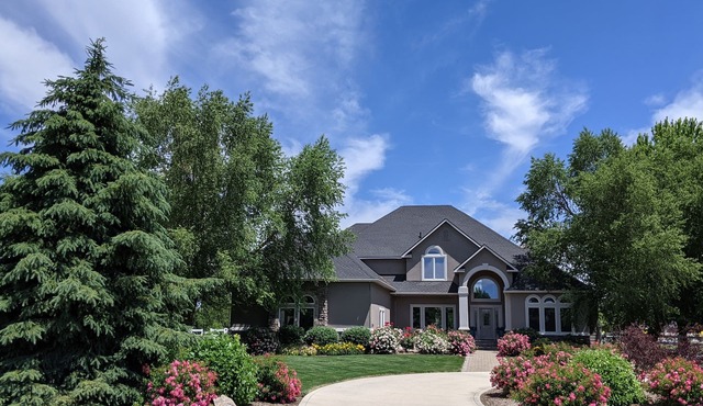 Spacious family home on two acres of beautiful lawn and gardens