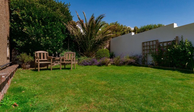 Spacious family house with panoramic sea views - short walk to the beach.