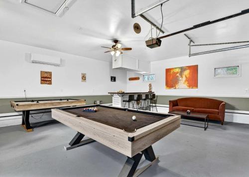 Spacious Family Retreat with Game Room, Fire Pit & River Access Nearby in Cabins, West Virginia