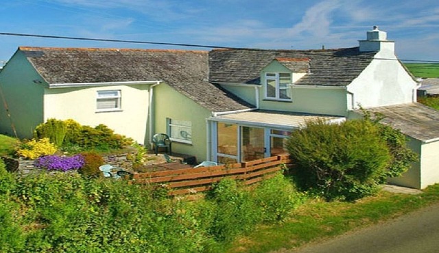 Spacious farmhouse with large childrens play area and fabulous family kitchen.