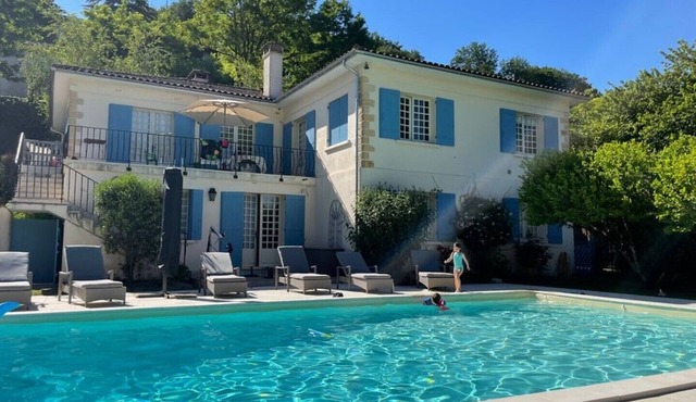 Spacious family villa with large heated pool & sundowner deck in pretty village