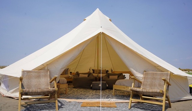 Spacious glamping tent on private sandy beach