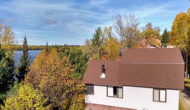 Spacious Group Cabin Overlooking Moose Lake with Vaulted Ceilings, Loft & Porch