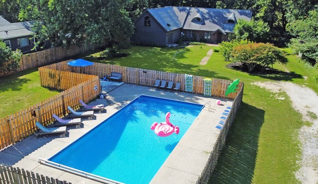 Spacious group getaway with heated pool, sauna, basketball court, and firepit. Sleeps up to 15 guests and is just minutes from Lake Michigan beaches and downtown St. Joseph. Perfect for family vacations, group trips, and relaxing Southwest Michigan.
