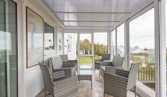 Spacious holiday home with panoramic views of the sea and golf course