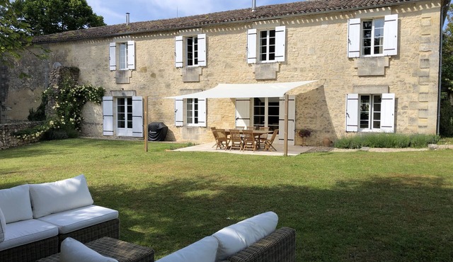 Spacious holiday home with a pool & private garden.