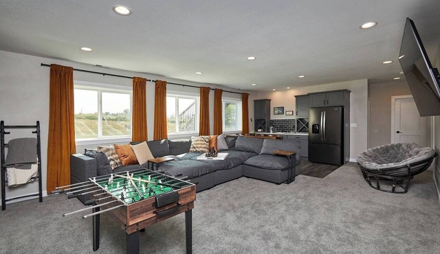 Spacious home for 12 with large family room, deck, and peaceful views