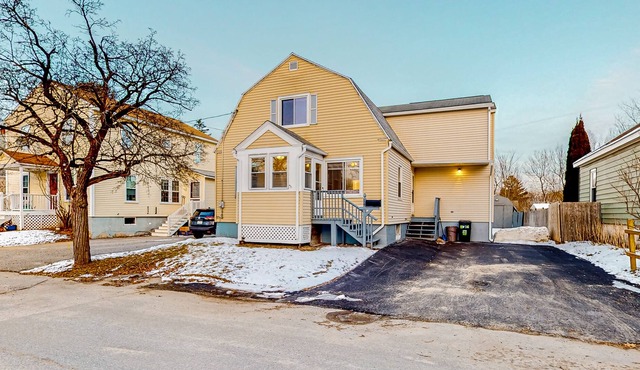 Spacious home in a central location with a firepit, enclosed yard, and W/D