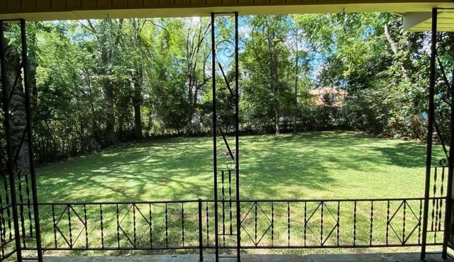 Spacious home in downtown Parsons! Conference room, HS internet, & private yard