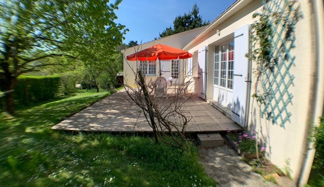 Spacious home in quiet setting with large gardens. A short distance from the sea