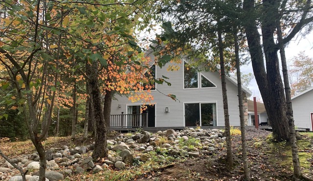 Spacious home on 5 acres with wonderful view of the river.