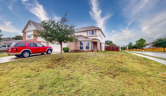 Spacious Home on Corner Lot with Gas Fireplace & Big Fenced Yard