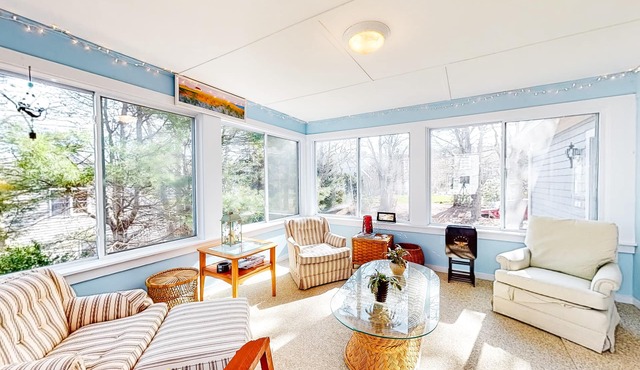 Spacious home on Hinckleys Pond with game room, sunroom & quick access to trail