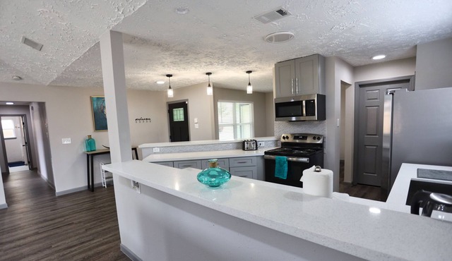 Spacious Home + Quiet Nbhd w/ Parking & Queen Beds + Central Location
