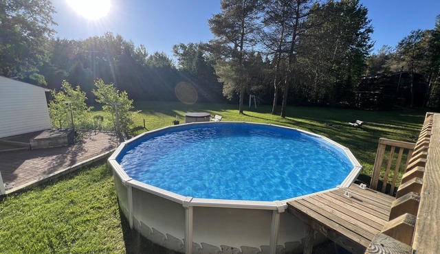 Spacious home with a private pool, hot tub, multiple decks, washer/dryer, & AC