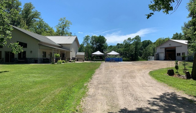 Spacious home with additional camper hook ups on 10 private acres.