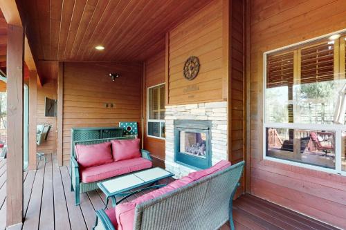 Spacious home with fireplace, multiple patios, balcony & grill