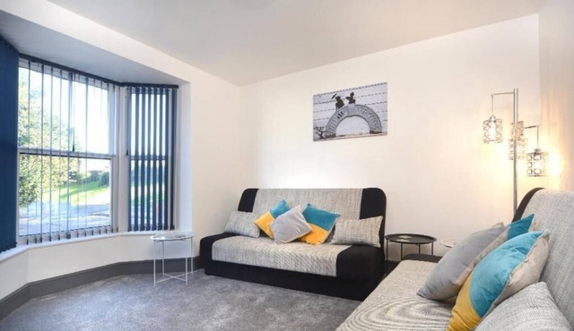 Spacious home with 8 beds, perfect for work trips or family stays. Enjoy the comfort of free parking, fast Wi-Fi, and a fully equipped space to relax or get things done.