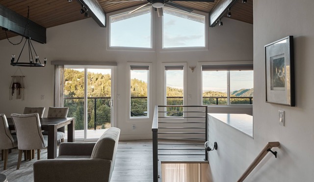Spacious home with modern finishes, beautiful views, 2 decks & fireplace