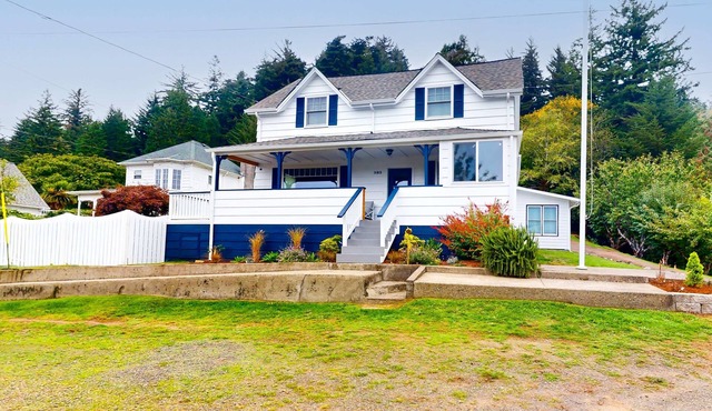 Spacious home with river views, hot tub, covered porch, deck, grill, & W&D
