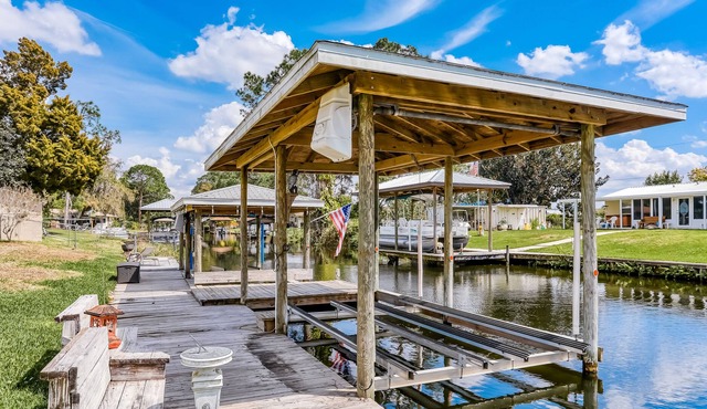 Spacious home with water view, dock, lovely patio, central AC & washer/dryer