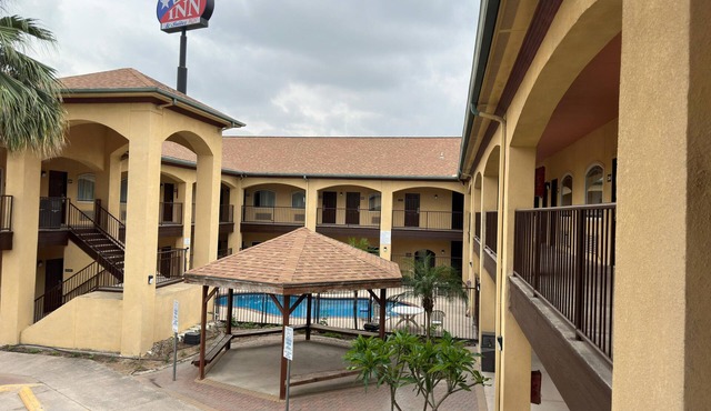 Spacious hotel suites with one king bedroom and one drawing room with Wi-Fi, AC.